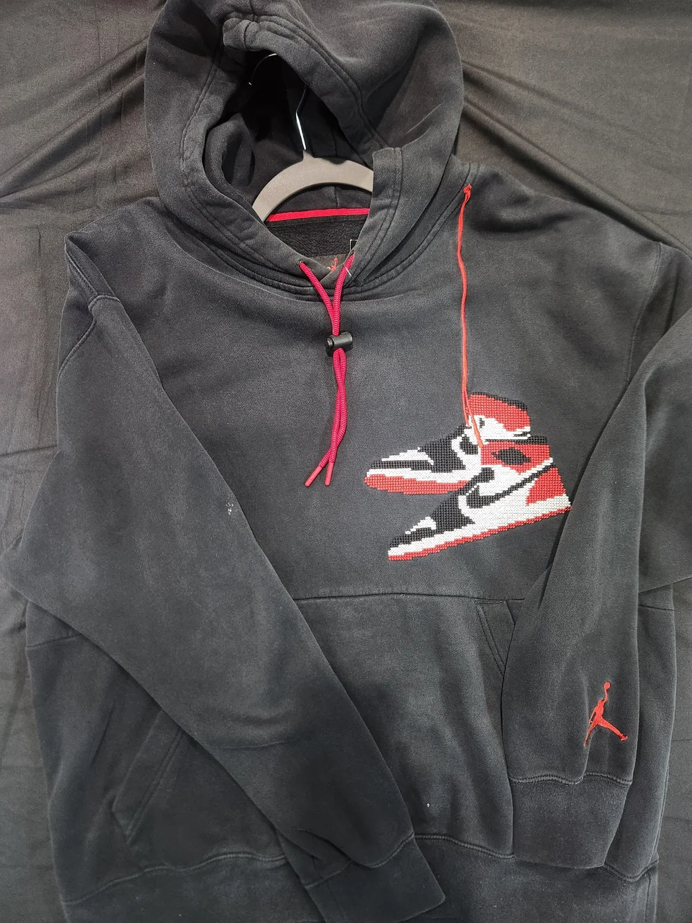 Jordan Black Hoodie with Red and White Sneaker Graphic